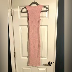 Never worn and perfect for the summertime or even now with a Jean jacket